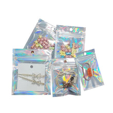 Load image into Gallery viewer, Holographic Gift Logo Custom Printed Bags Aluminum Foil Zip Lock Clear Plastic Packaging Mylar Bag For Cosmetic Clothes
